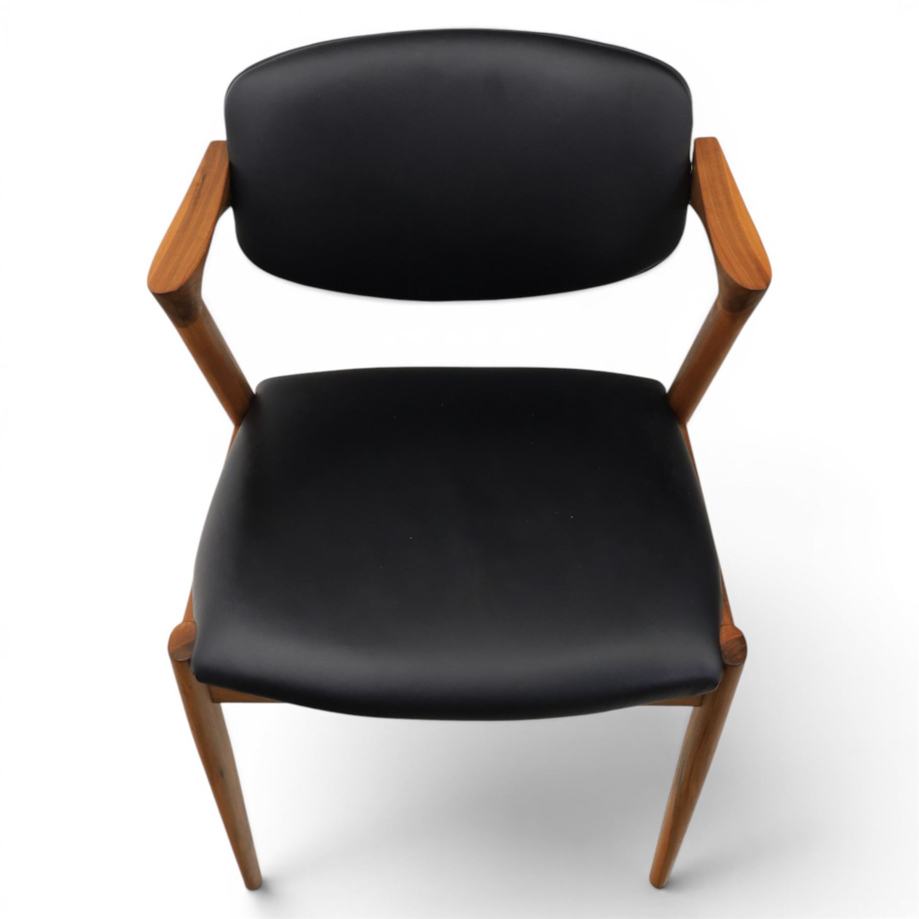 Kai Kristiansen (Danish c.1929-2022) - Pair of mid-20th century teak elbow chairs upholstered in black leatherette