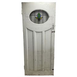 1930s external door with stained leaded glass panel (86cm x 203cm), six small stained glass windows in wooden frames (W52cm); and various loose stained leaded glass panels