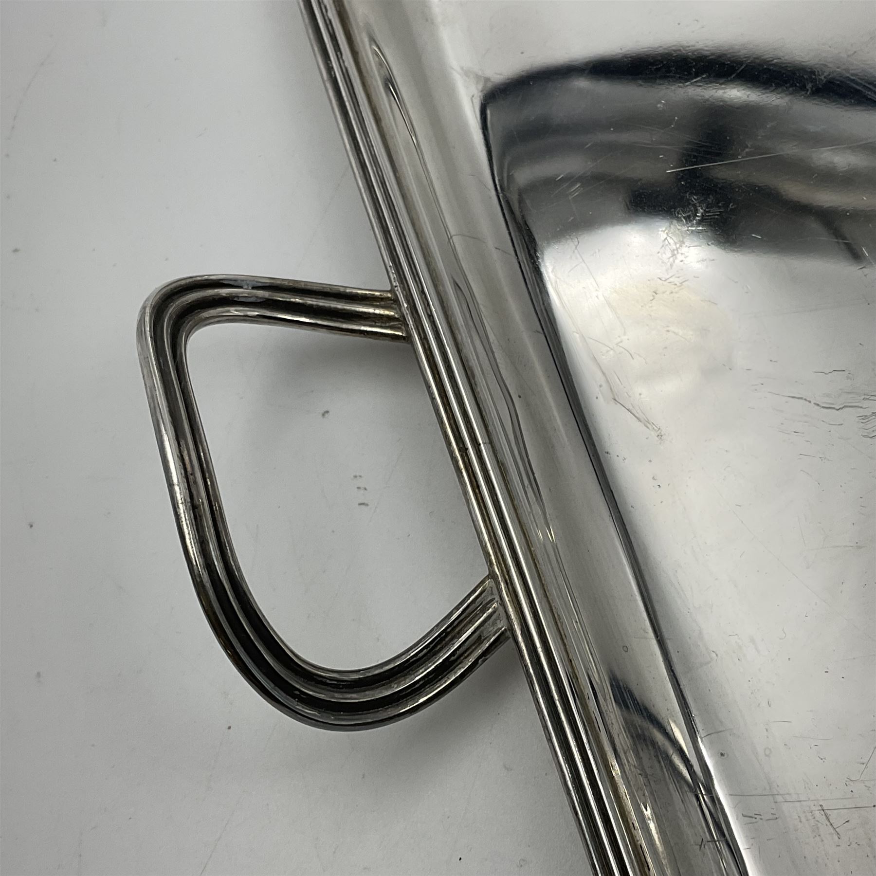 Small early 20th century silver tray, of rectangular form with reeded edge and twin reeded handles, hallmarked Asprey & Co Ltd, London 1914, including handles W26.5cm