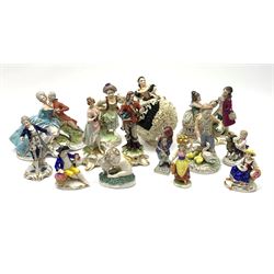 A group of various Continental figures, to include examples marked Dresden and Capodimonte, plus others with spurious blue cross marks beneath. (14). 