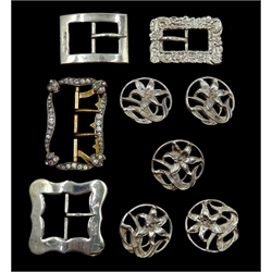 Set of five Edwardian silver buttons, stylised foliage design by Reynolds & Westwood, Birmingham 1901, two silver shoe buckles by Colen Hewer Cheshire, Chester 1902/3, silver buckle with embossed decoration by Synyer & Beddoes and a paste silver buckle stamped