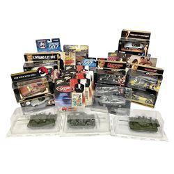 Corgi - The Definitive Bond Collection and The Director's Cut - nine die-cast vehicles from You Only Live Twice, Goldfinger, For Your Eyes Only, Diamonds Are Forever etc; Corgi Classics Moonraker Shuttle and Lotus Esprit; two other Corgi James Bond packs; Carrera Die Another Day Aston Martin V12 Vanquish; nine Johnny Lightning carded James Bond vehicles; Dragon carded Wai Lin figure; and three Fabbri tanks; all boxed/packaged (27)