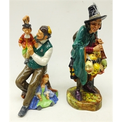  Two Royal Doulton figures comprising 'The Puppetmaker' HN2103 and 'The Mask Seller' HN2253, tallest 22cm  