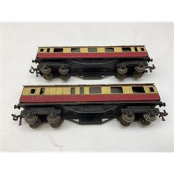 Hornby Dublo - nine passenger coaches, forty-two wagons, small quantity of 3-rail track, level crossing and other accessories; all unboxed