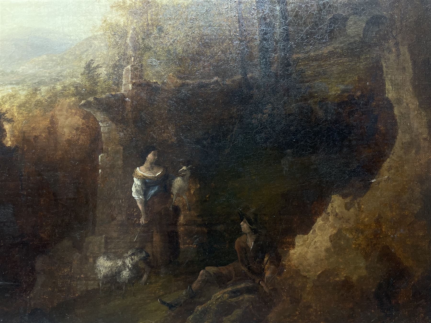 Jan Dircksz Both (Dutch 1615/18-1652) and Andries Both (Dutch 1612/1613-1642): Shepherd and Wife within an Italian Landscape, oil on canvas attributed and titled on the mount 60cm x 50cm 
Provenance: previously owned by the Countess Michalowski, Cork 
Notes: this picture captures the typical golden Italian light and shadowy foreground that Both highlighted in many of his works from the 1630s and early 40s. It is likely the figures were executed by his elder brother Andries, who drowned in Venice 1642.