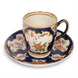 18th century Worcester coffee cup and saucer, circa 1770,  painted with shaped panels of c...