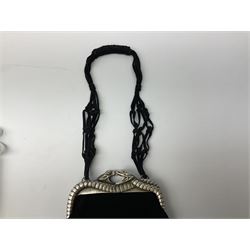 Lalique serpentine lined evening handbag, the black suede body decorated with embroidered snake design with silver colour thread and snake metal clasp, housed in original dust bag
