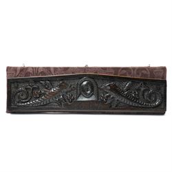 17th century walnut frieze, or pediment, carved with a smiling mans faced flanked my two c...