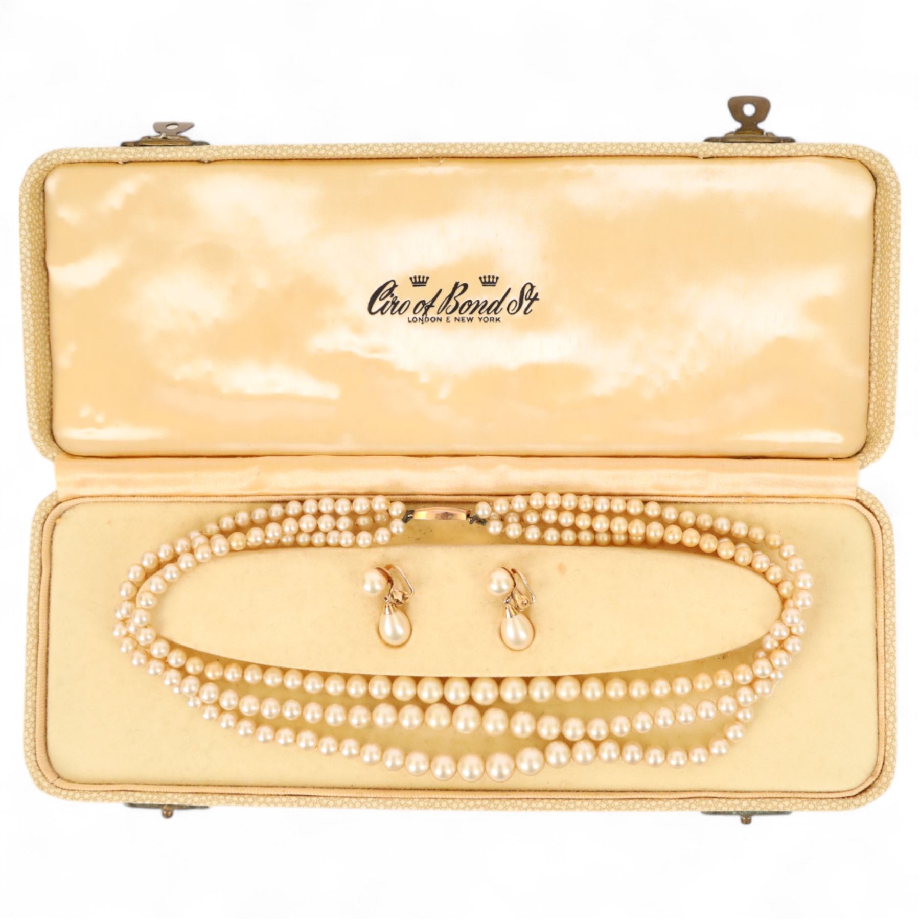 Ciro three strand faux pearl necklace wit 9ct gold clasp, and matching earrings with 9ct gold mounts, boxed