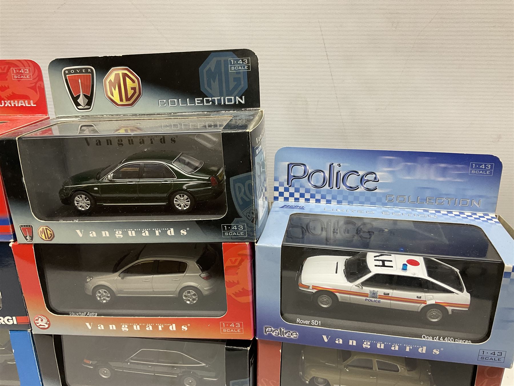 Lledo and Vanguard 1:43 scale die-cast models including Land Rover, Vauxhall, MG, Police and others, all boxed (21)