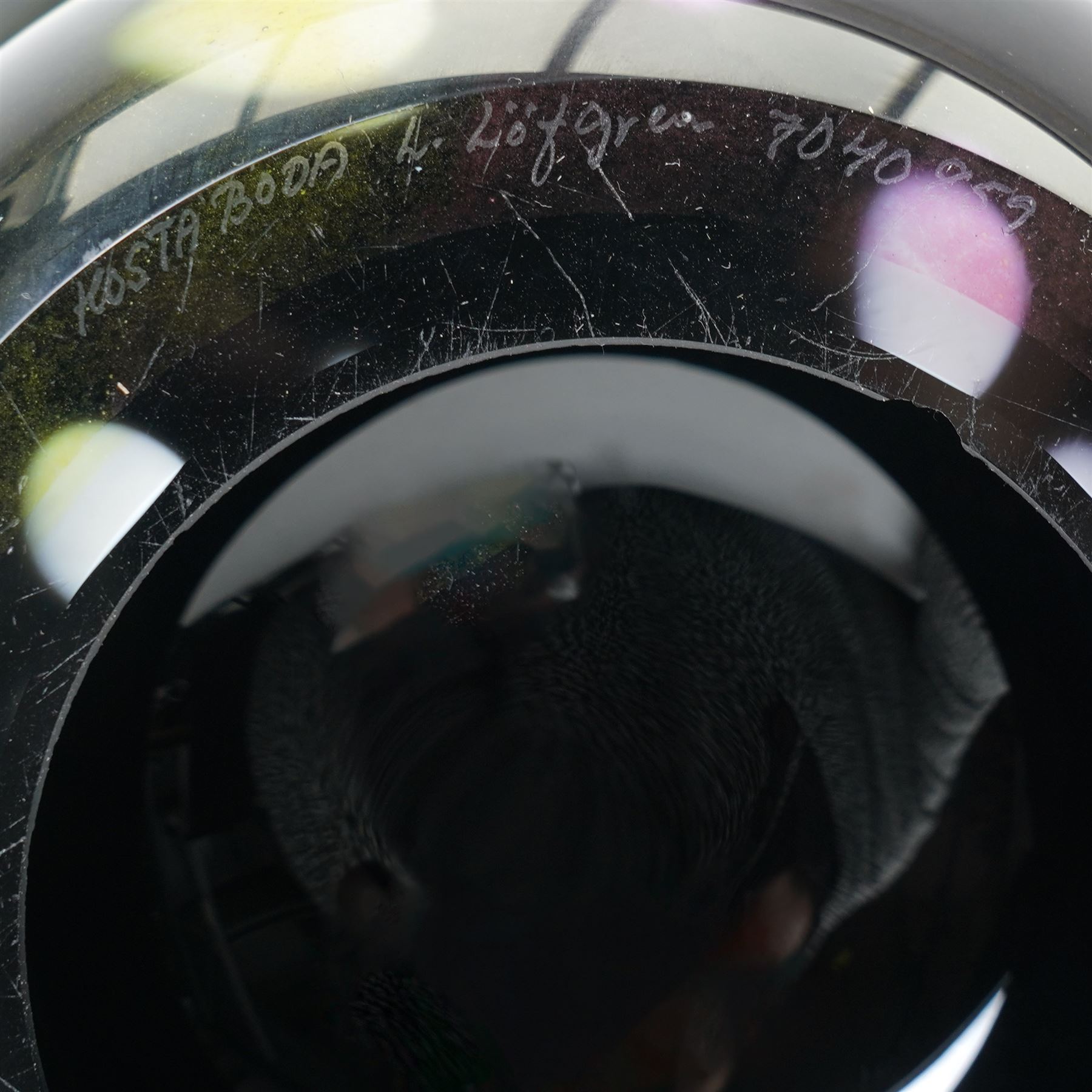 Ludvig Lofgren for Kosta Boda vase, decorated with mottled detail in purples and greens, upon a black ground, signed beneath, H46cm