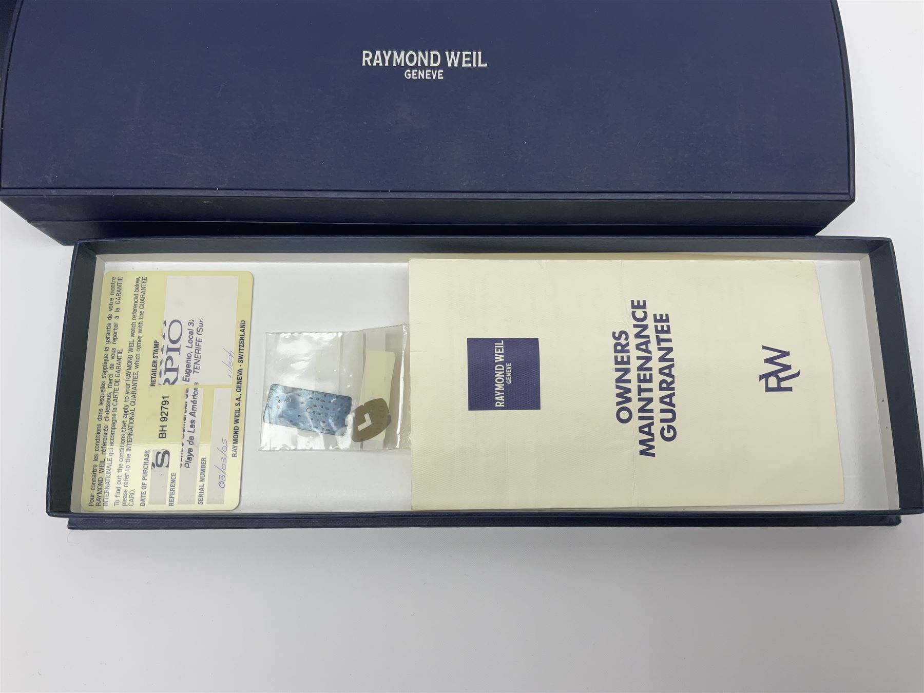 Raymond Weil ladies 'Othello' wristwatch, the rectangular 18ct gold plated case with blue enamel dial, on a Raymond Veil navy blue crocodile leather strap, in original box