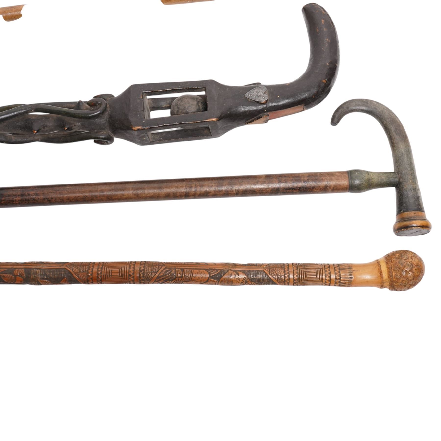 Collection of walking sticks including Greek racing walking stick, carved horse head and jockey, marked KEPKVPA, Horn Handled Walking Sticks, one stamped 