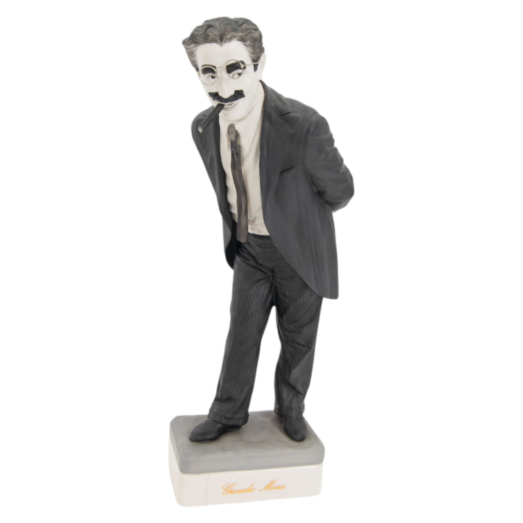 Two Spanish Algora Personajes Del Cine figures, modelled as Charlie Chaplin and Groucho Marx, with printed marks beneath, both with certificates of authenticity, H35cm