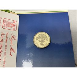 Two Great Britain and Northern Island proof sets dated 1970 and 1971, both with card cases, three 1986 Commonwealth Games commemorative two pound coins, in card folders, and six brilliant uncirculated one pound coins, in card folders
