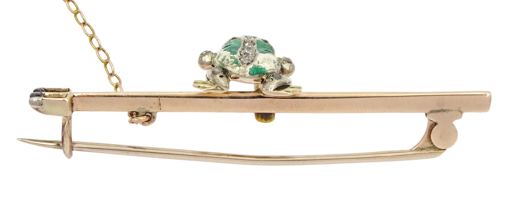 Edwardian frog and spear brooch, the gold and silver green enamel spinning frog set with old cut diamonds and stone set eyes, sat on a gold spear, with registered design number Rd 364025