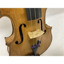 Copy of a full size Stradivarius violin, with an ebonised fretboard, tailpiece and tuning pegs, with a polished chin rest  Length 60cm