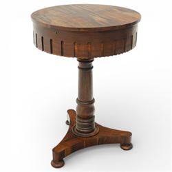 Regency period mahogany pedestal drinks table, circular top raising to reveal concealed dr...