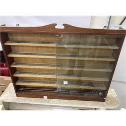 Six shelved cabinets for displaying ‘00’ gauge locomotives comprising plain plywood and white painted examples with track applied to various shelves, largest H63cm, W107cm, D27cm; Collection of tools for building model locomotives to include Weller PU-2D Soldering Pencil and Standard Tip Soldering Iron 20W/230V, Humbrol Modellers Airbrush, Power Supply Units and two wooden chests one of which housing a collection of tools including tweezers, scalping tools, wrenches etc 