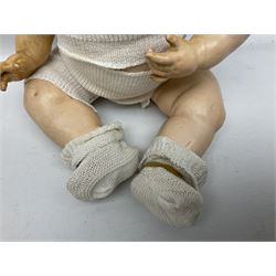 Carl Harmus Germany bisque head doll with applied hair, sleeping eyes, open mouth with teeth and composition body with jointed limbs; marked 'Harmus 313.4/0 Germany' H38cm; and Alt, Beck & Gottschalk Germany bisque head doll with applied hair, fixed eyes, open mouth with tongue and composition body with jointed limbs H44cm (2)