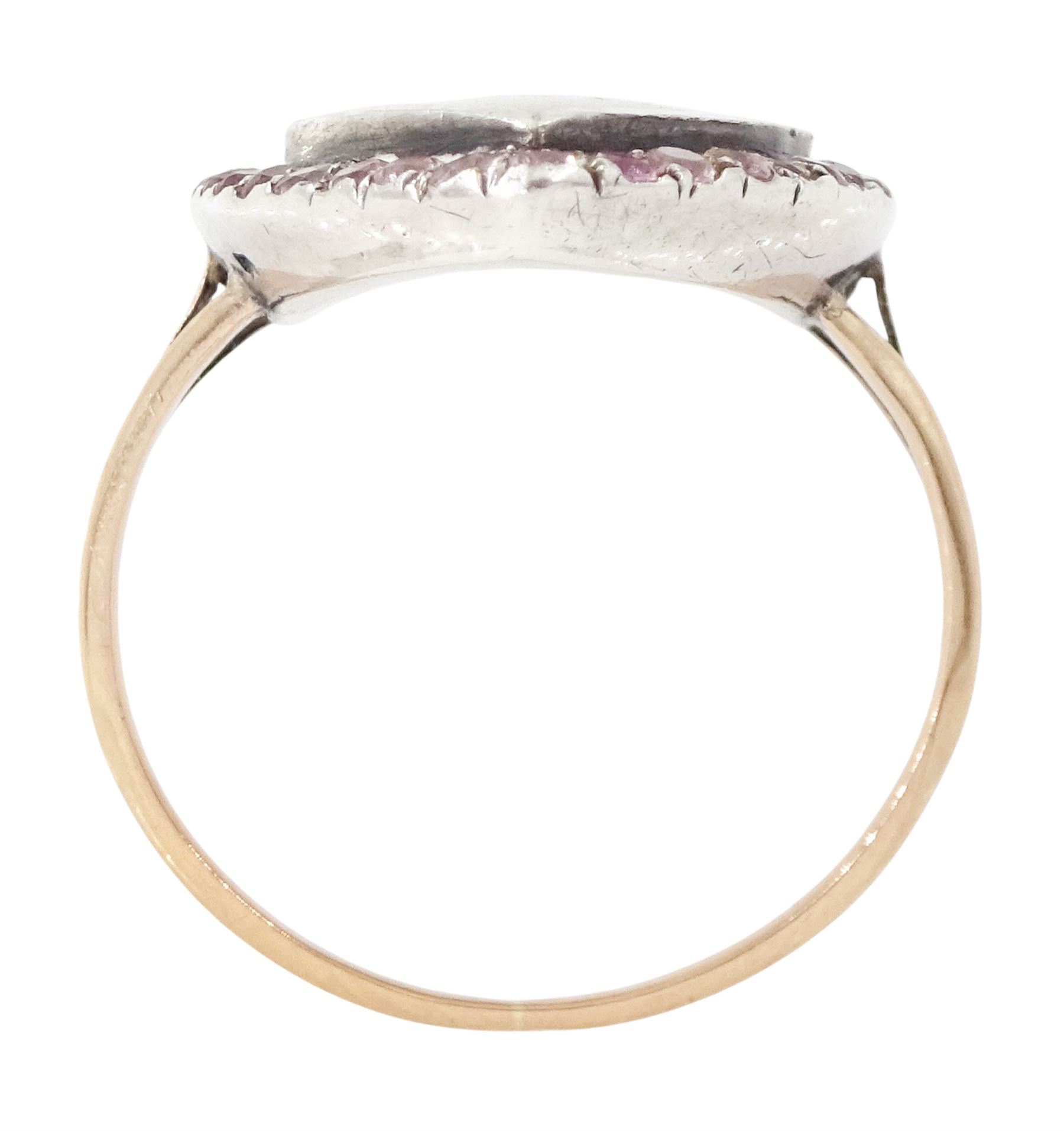 18th / 19th century gold and silver paste stone set portrait ring, the navette bezel set with a miniature of a woman on ivory, under a glazed panel, within a pink paste border and trifurcated shoulders. This lot has been registered for sale under Section 10 of the APHA Ivory Act