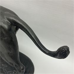 After Paul Edouard Delabrierre (French, 1829-1912), bronze, model of a lion, upon an oval base, signed E Delabrierre, overall H29.5cm, L46cm