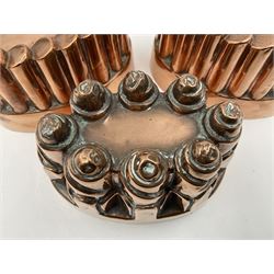 Five Victorian copper jelly mould, largest H10cm, L16cm