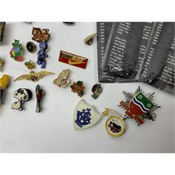 Three Sekonda wristwatches, together with other wristwatches, enamel badges and collectable badges