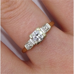 Gold three stone diamond ring, stamped 18ct , central diamond approx 0.30 carat