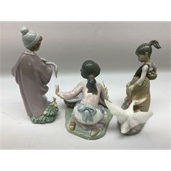 Three Lladro figures, comprising Follow Us no 6101, It's Your Turn no 5959 and Aggressive Goose no 1288, largest example H24.5cm 