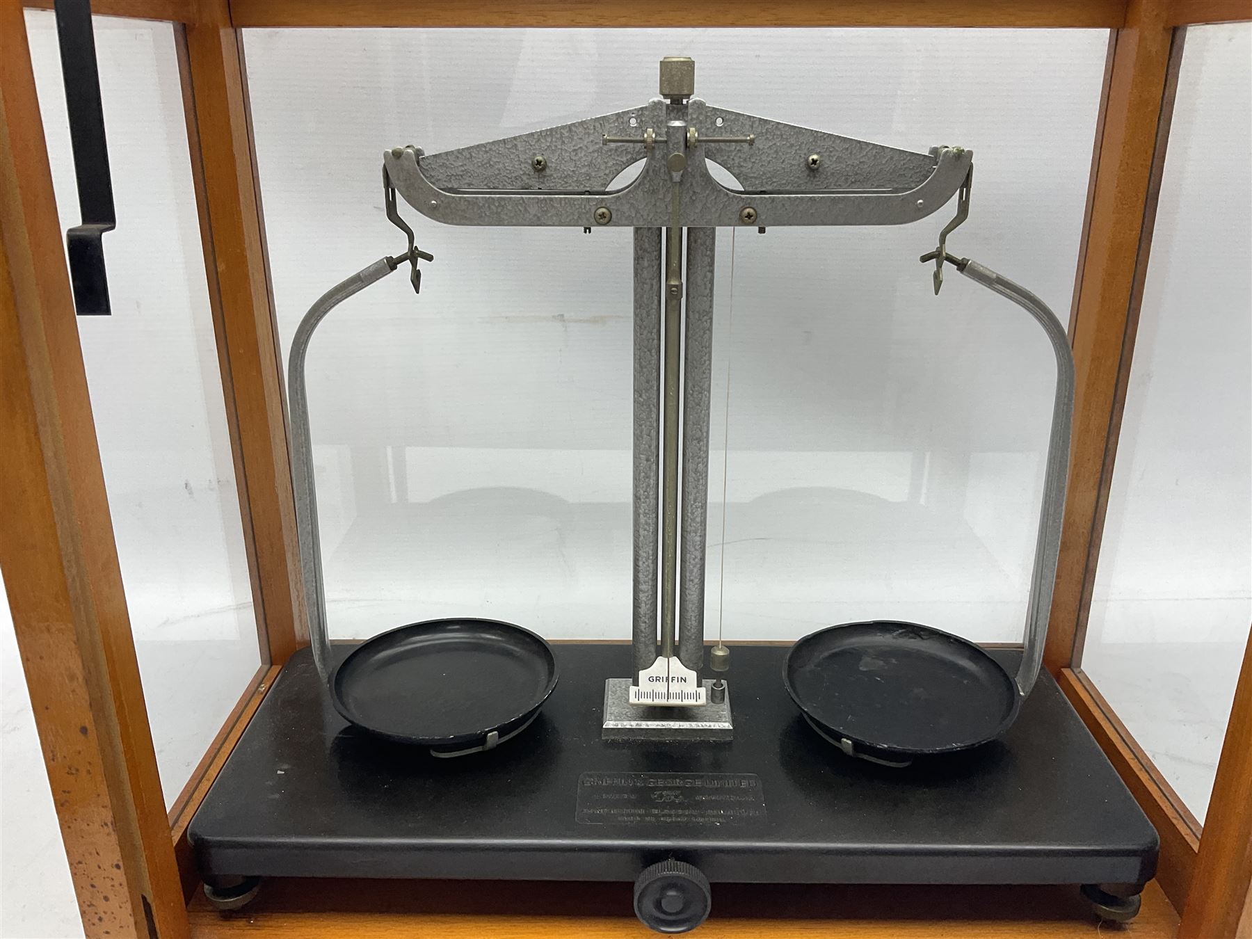 Griffin & George set of laboratory scales in fully glazed hardwood cabinet with rise-and-fall front door L44.5cm H40cm; with beech box of brass weights by Philip Harris & Co Ltd