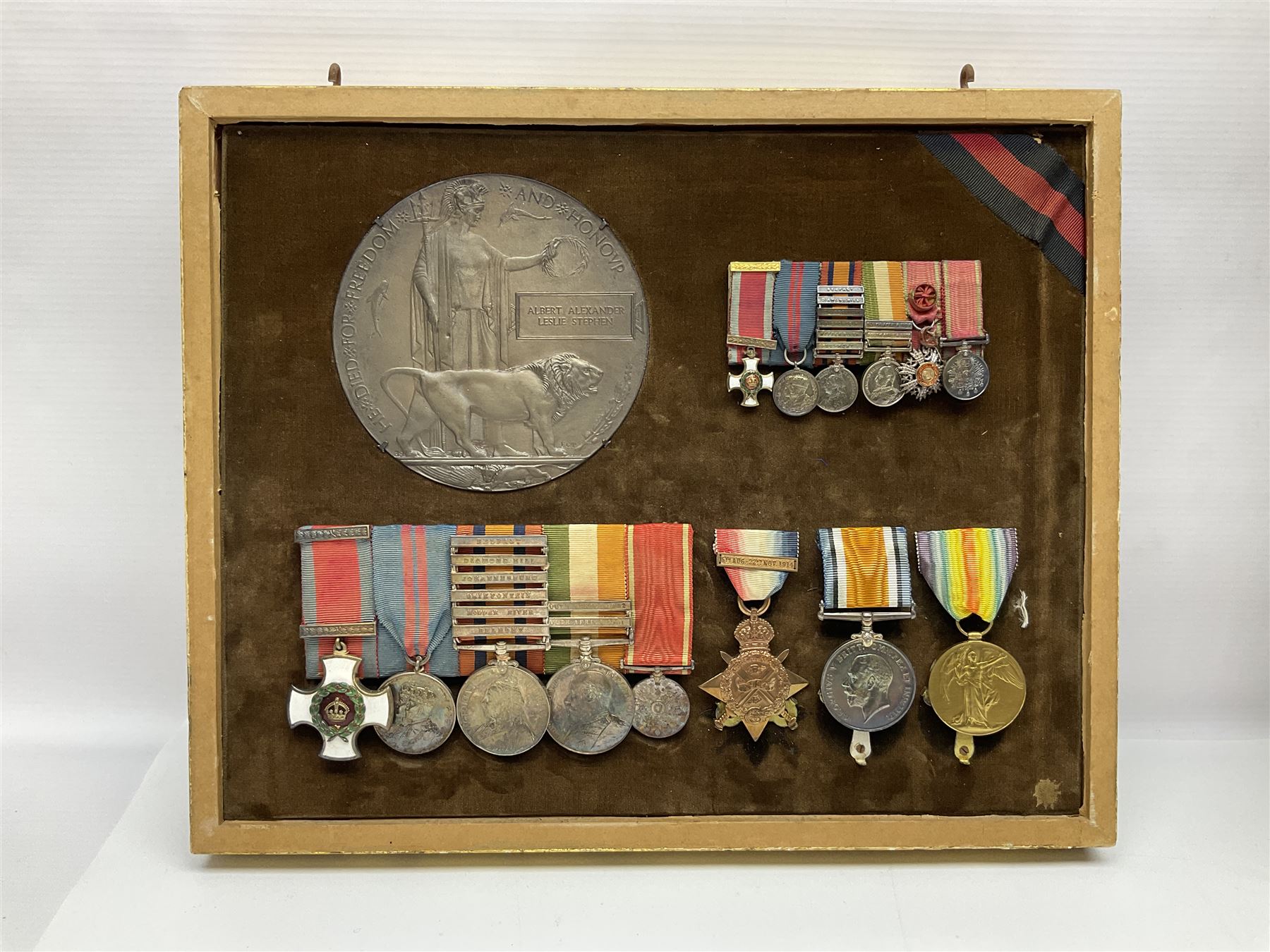 KIA (Ypres)  DSO group of eight Boer War/WW1 medals comprising Victorian DSO, Queens South Africa Medal with six clasps for Belmont, Modder River, Driefontein, Johannesburg, Diamond Hill and Belfast, Kings South Africa Medal with two clasps for South Africa 1901 and South Africa 1902, Turkish Liakat Medal, WW1 1914 Star with 5th Aug - 22nd Nov 1914 bar, British War Medal and Victory Medal and George V 1911 Coronation Medal, awarded to Lieutenant (later Captain) Albert Alexander Leslie Stephen Scots Guards; the group of six Boer War miniatures including additional Turkish Order of the Medjedie 3rd Class with rosette; all with ribbons and later mounted and framed with his bronze memorial plaque; together with Cecil Cutler (active 1886-1934) heightened watercolour three-quarter length portrait of Stephen in uniform, signed and dated 1915, 52 x 35cm; gilt frame;
Auctioneer's note: STEPHEN, ALBERT ALEXANDER LESLIE, Lieutenant, was born 3rd February 1879, son of Major J Z Stephen and Augusta Henrietta Mary (nee Ricketts). He was educated at Eton, and joined the Scots Guards 4th January 1899, becoming Lieutenant 4th April 1900. He served in the South African War, in which he was present at a large number of engagements. He took part in the advance on Kimberley, with the action at Behnont, and was present at Enslin, Modder River and Magersfontein, and also at the operations in the Orange Free State, Transvaal, Orange River Colony and Cape Colony, including actions at Poplar Grove, Driefontein, Vet and Zand Rivers; the action near Johannesburg, those at Pretoria, Diamond Hill and Belfast. From January 1901, he was Assistant Provost-Marshal to Pulteney's Column, and he was Intelligence Officer to Garrett's Column in 1902. He was twice mentioned in Despatches [London Gazette, 10 September 1901, and 29 July 1902]; received the Queen's Medal with six clasps; the King's Medal with two clasps, and was created a Companion of the Distinguished Service Order [London Gazette, 31st October 1902]: 