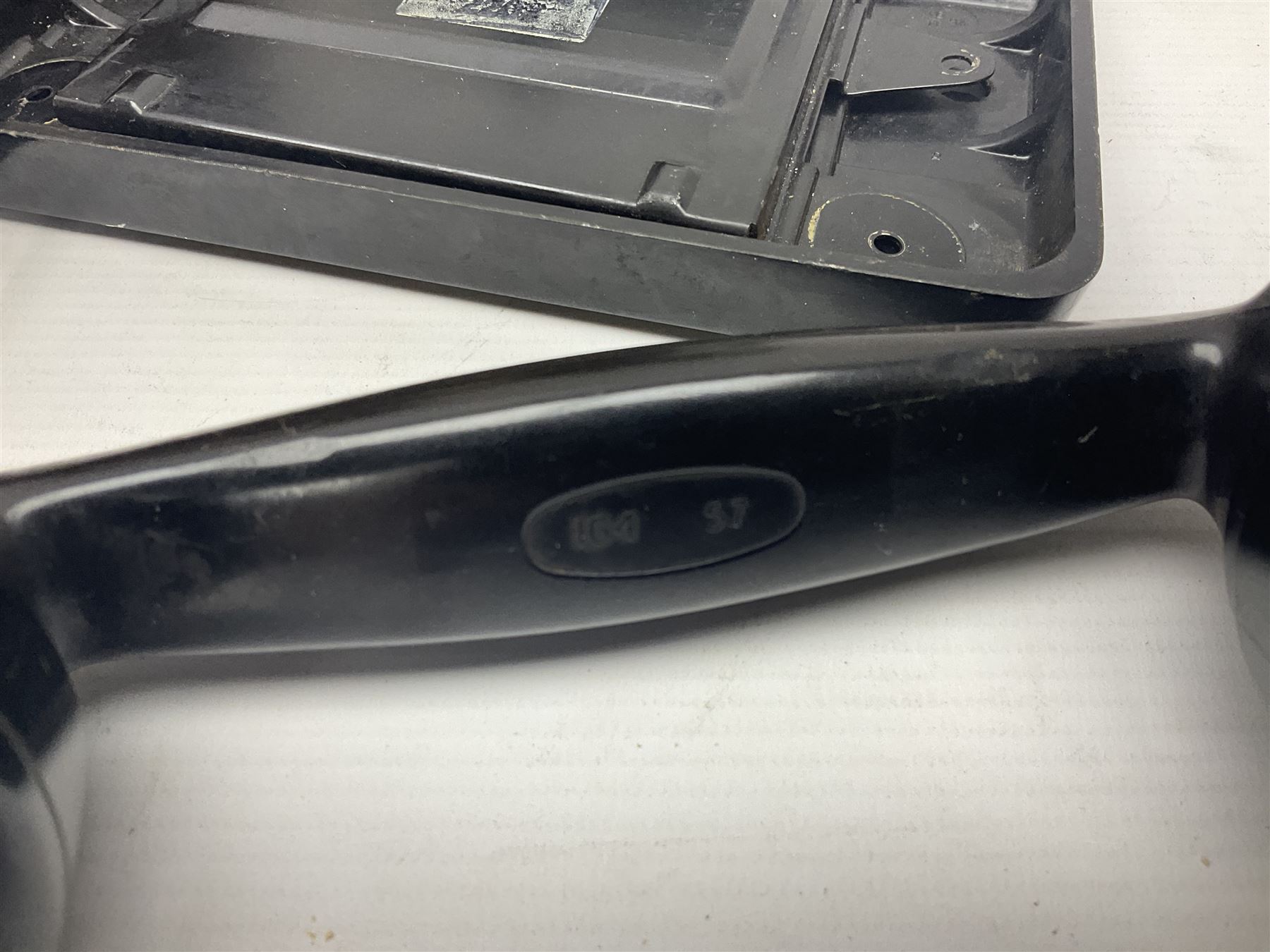 Collection of phone headsets, including GPO bakelite examples, together with other telephone parts 