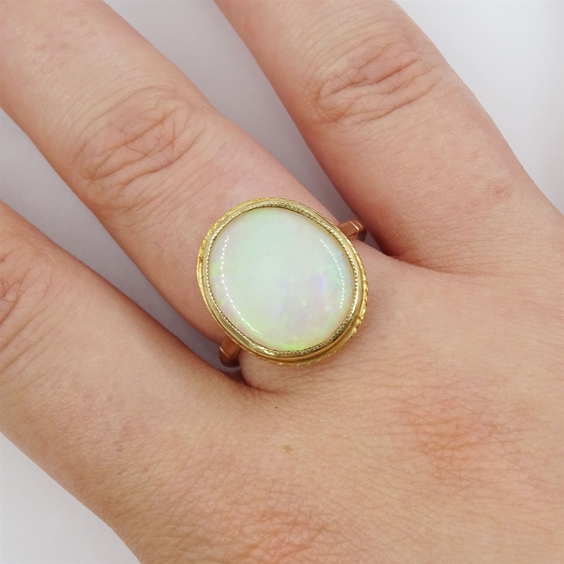 Early - mid 20th century gold single stone opal ring