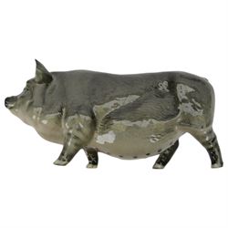 Three Beswick pigs, comprising Saddleback, Vietnamese and Berkshire Boar and a Wensleydale sheep 