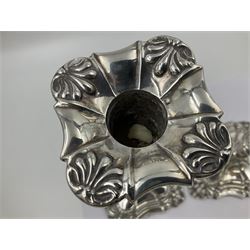 Pair of late Victorian silver mounted candlesticks, each of knopped and part fluted form, upon square stepped base with anthemions to each corner, with conforming sconces, hallmarked to removable sconces and foot, Thomas A Scott, Sheffield 1901, H25.2cm