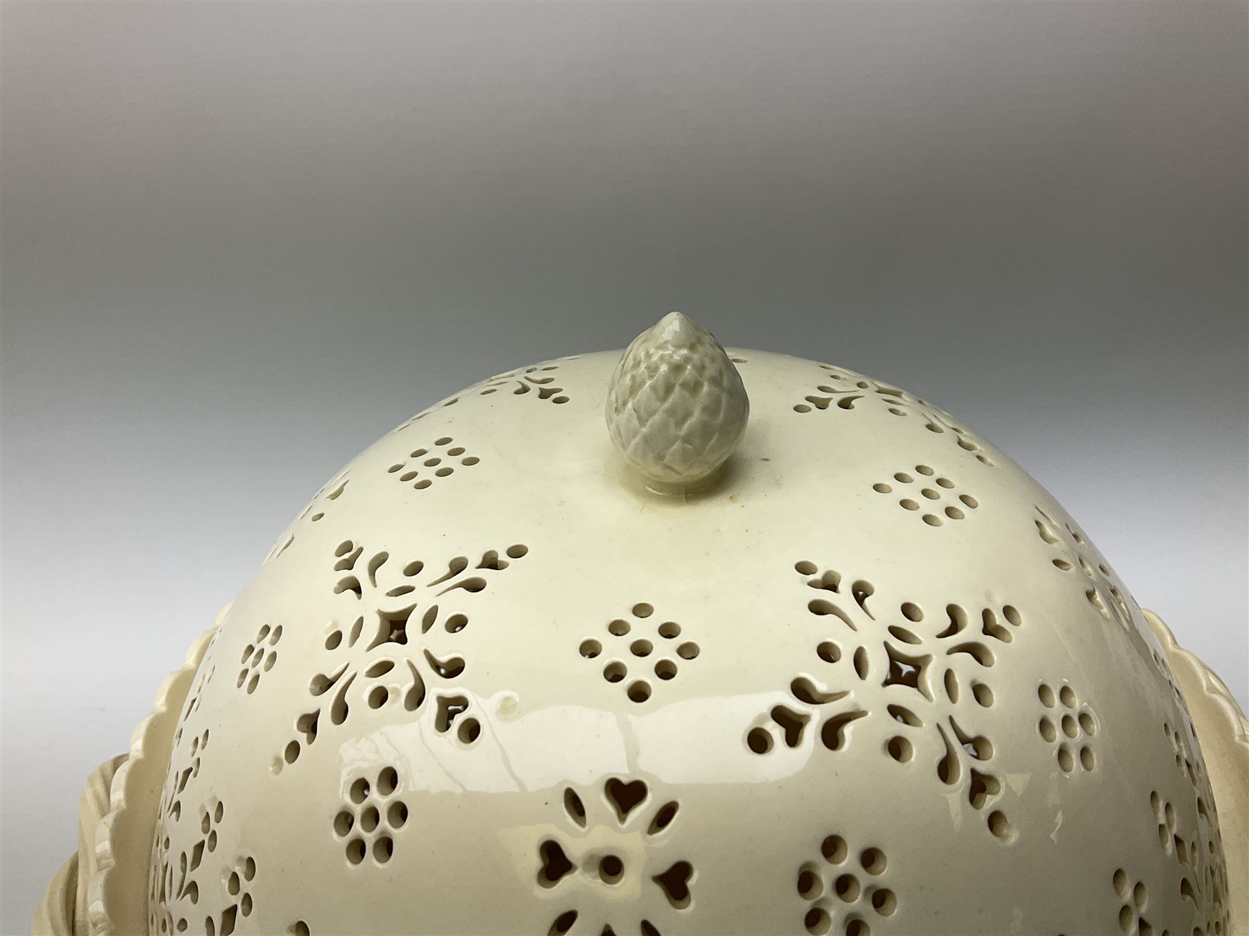 Large 20th century Leeds pottery basket and cover, of bulbous form with pierced detail and twin rope handle, with impressed mark beneath, H23cm D25cm