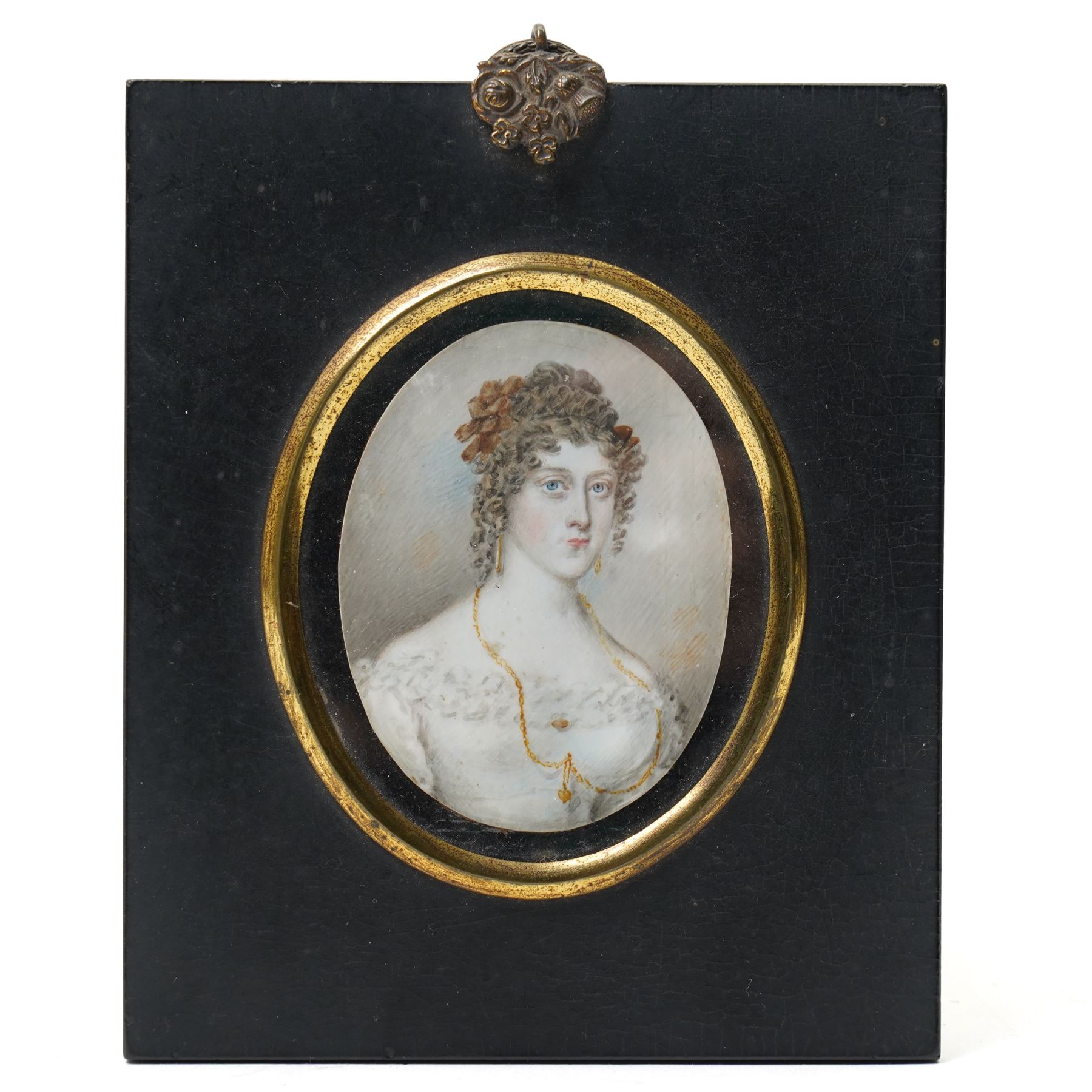 19th century miniature half length portrait on ivory of a lady wearing a gold locket, ebonised frame 13.5cm x 11.5cm