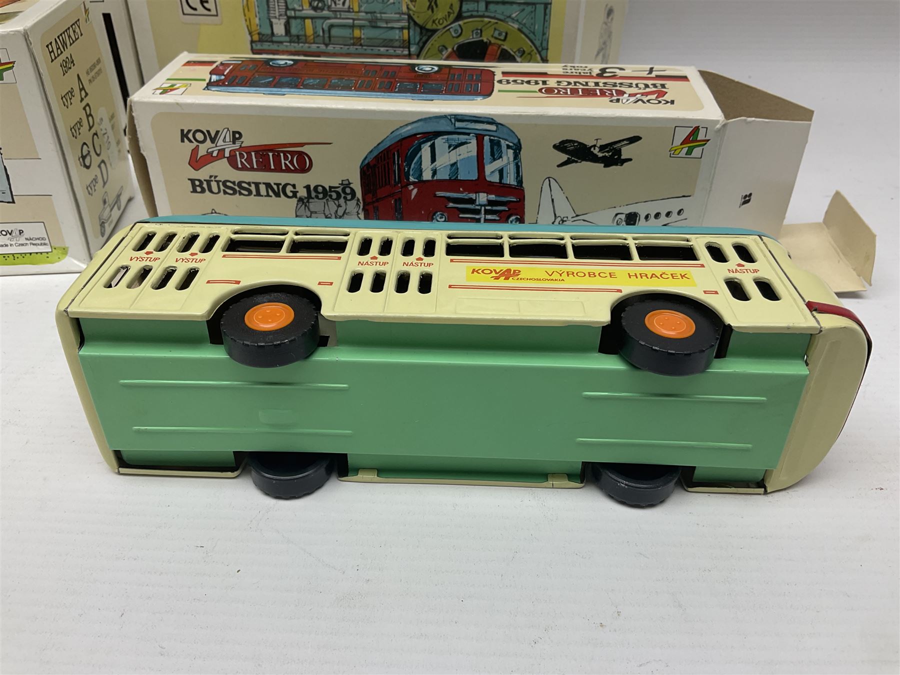 Kovap - eleven tinplate models to include Tractor and Trailer, Road Roller 1927, Moving Moneybox 1924, Hawkeye type B 1924, Boy on a Tricycle; all in original boxes 