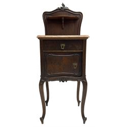 Late 19th to early 20th century walnut bedside pot cupboard, the shaped raised back with carved C-scroll pediment, pink variegated marble top, fitted with single drawer and cupboard, foliage carved cabriole supports with scroll carved terminals