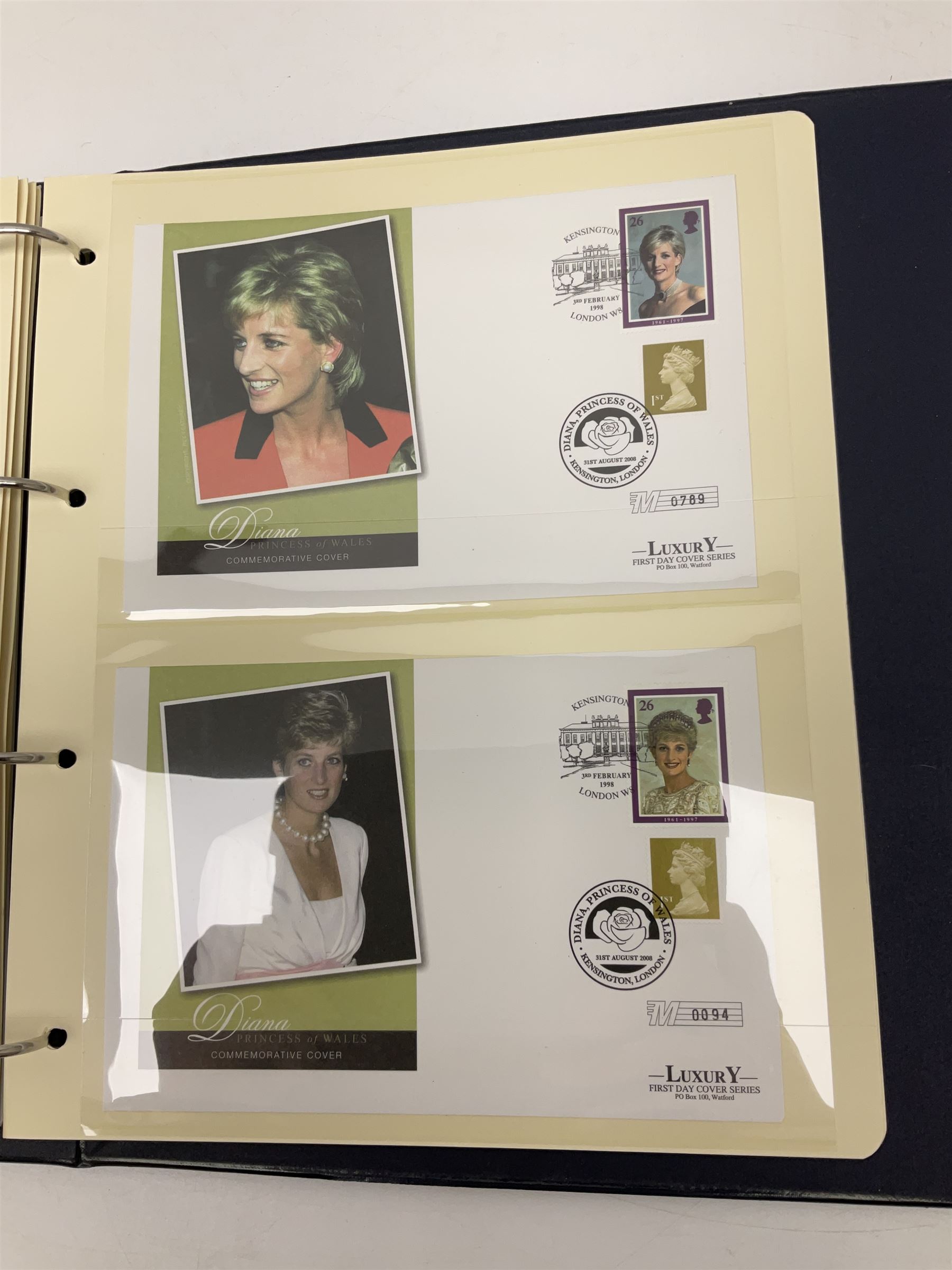 Stamp and coin covers, including 2006 'Her Majesty Queen Elizabeth II 80th Birthday' containing five pounds coin, first day covers relating to Diana Princess of Wales etc, housed in a ring binder folder