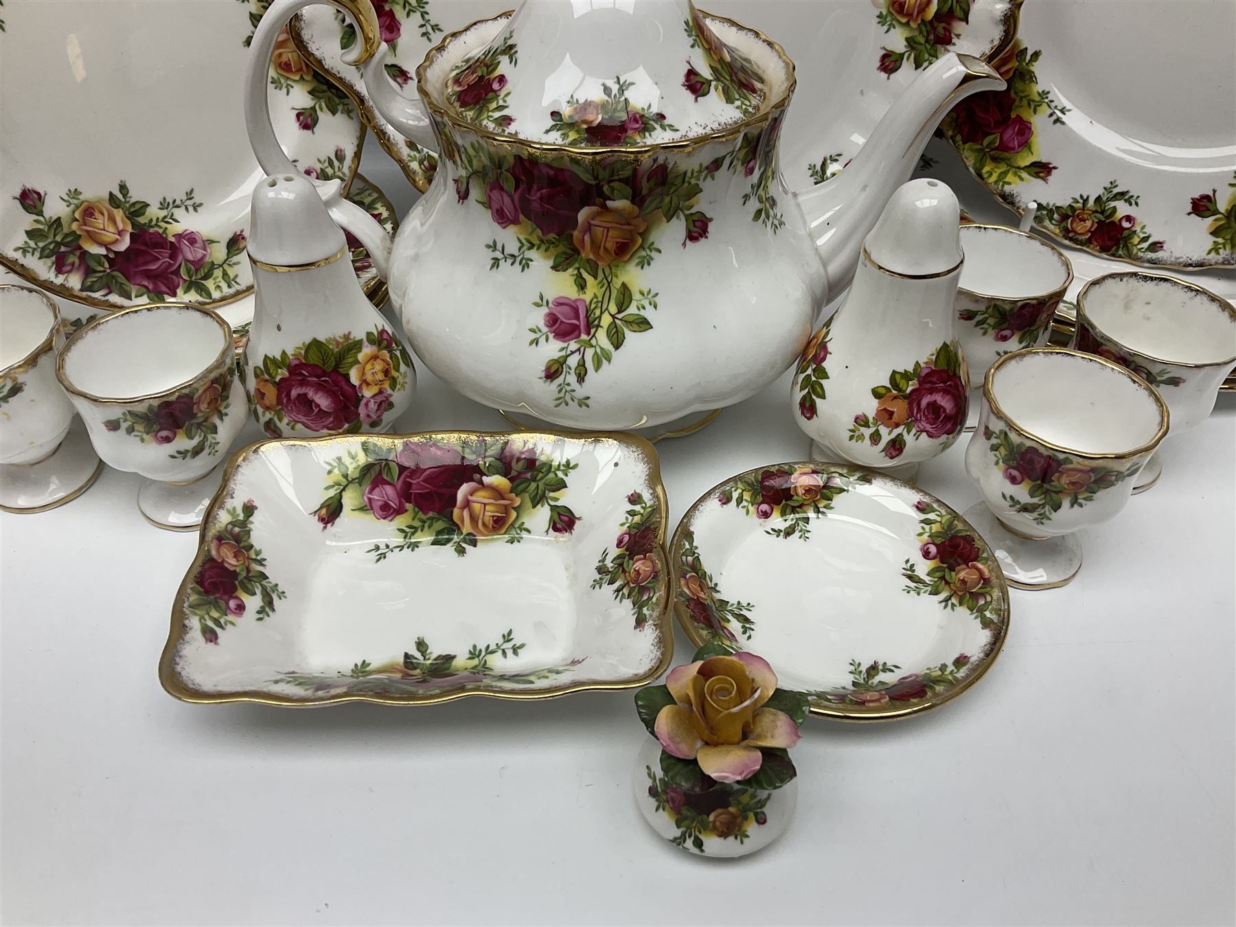 Royal Albert Country Roses pattern part tea and dinner service, to include teapot, four cups and saucers, four dessert plates, cake plate etc, (41)