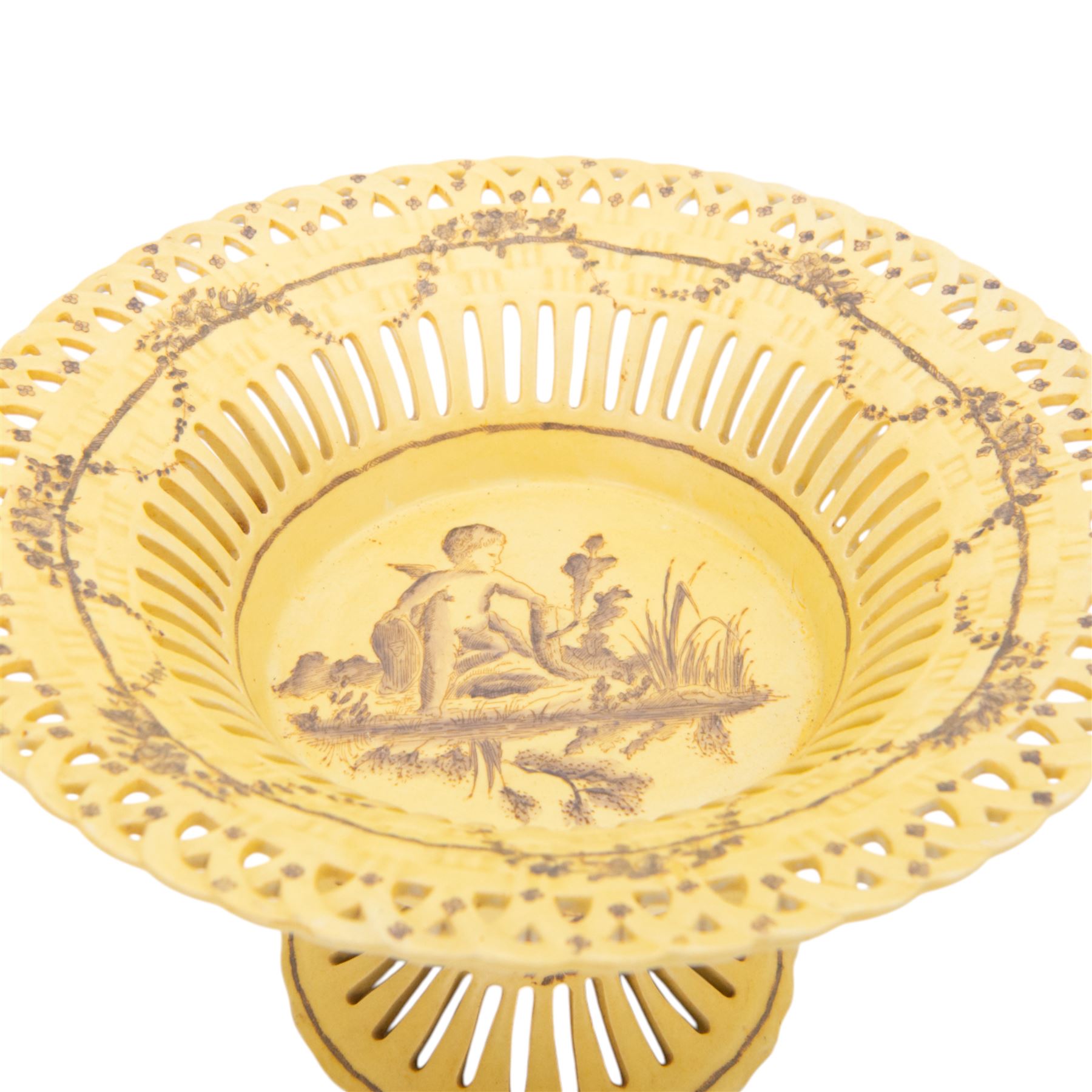 Continental tazza, decorated with swag, the central panel with cerub, marked Toussi Court beneath, H20cm