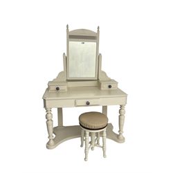 Edwardian cream painted dressing table, fitted with rectangular swing mirror over two trinket drawers with ceramic handles, rectangular top with frieze drawer, raised on turned front supports; with circular stool, leather seat over four turned supports