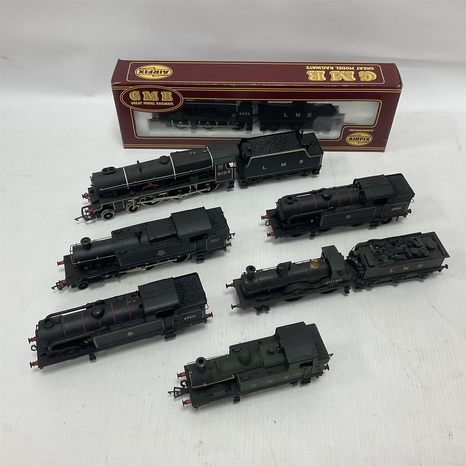 Airfix ‘00’ gauge - seven locomotives comprising Class 7P (Royal Scot) ‘Royal Scots Fusilier’ 4-6-0 no.6103 in LMS black with Mainline tender; two Class N2 0-6-2T no.69531 in BR black; Class 1282 2-4-0 no.20185 in LMS black; Class 61XX 2-6-2T no.6167 in BR black; Class 14XX 0-4-2T no.1466 in GWR green, all unboxed; Class 4F 0-6-0 no.4454 in LMS black, in original box (7)