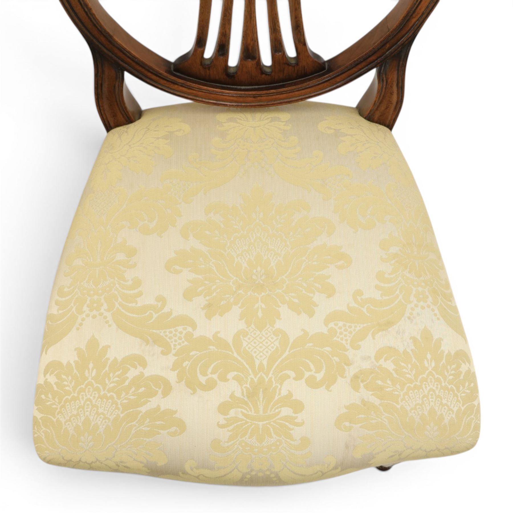 Bevan Funnell Reprodux - Regency design set of ten mahogany dining chairs, oval backs with central splat with rose motif, serpentine seat upholstered in damask fabric, raised on turned supports