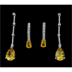 Pair of 9ct white gold pear shaped citrine and diamond pendant stud earrings, stamped 375 and a smaller pair of yellow gold citrine and cubic zirconia pendant stud earrings, stamped 10K