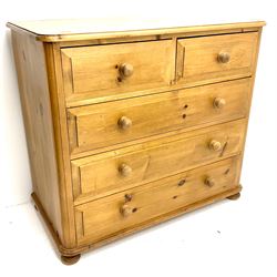 Solid pine chest, two short and three long drawers, bun feet