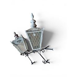 Foster & Pullen (Bradford est. 1896) - Good pair of late 19th century copper coach house or street lamps, painted in rustic white finish, with iron corner brackets, one with clear glass, the other with ring mottled glass, both converted to electricity, height with bracket 150cm