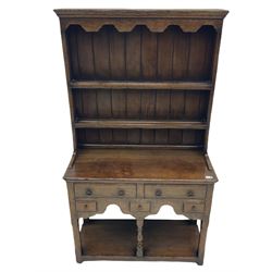 Georgian style oak dresser and rack, fitted with five drawers above pot-board base